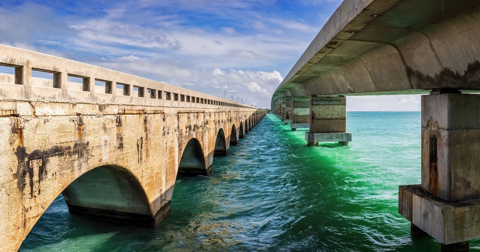 Historic and modern Seven Mile Bridge, Florida Keys, at sunset